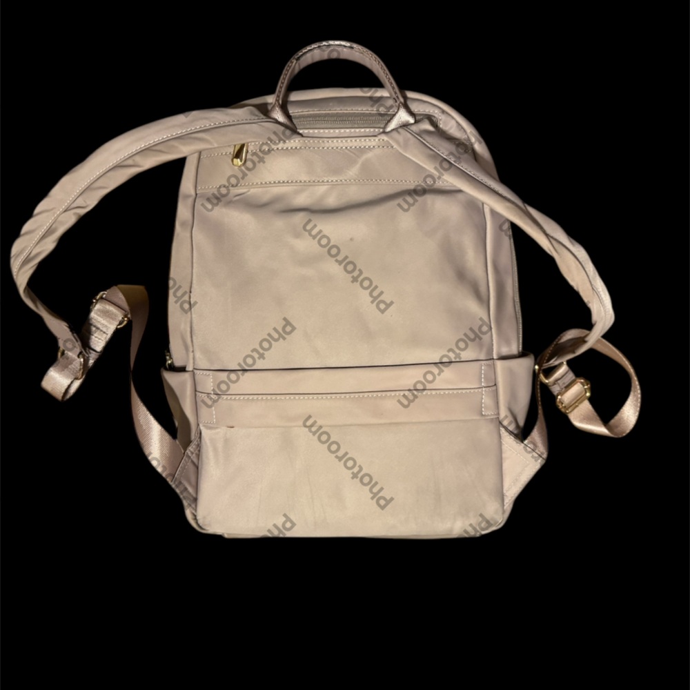 Cole Haan backpack,beige pink colour,great for traveling